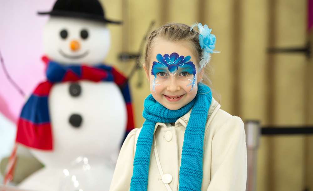 Portrait,Of,Little,Girl,With,Christmas,Face,Painting